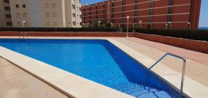 Basen w obiekcie Playa de Oro con Parking lub w pobliżu