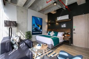 TV a/nebo společenská místnost v ubytování Factory Lofts Hotel
