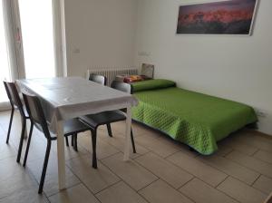 Postel nebo postele na pokoji v ubytování Appartamento Wilma