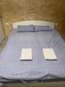 A bed or beds in a room at Colonel apartment 956