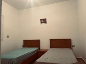 Postel nebo postele na pokoji v ubytování Dar Maya