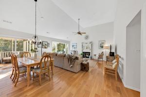 a dining room and living room with a table and chairs at 2713 Seabrook Island Road in Seabrook Island