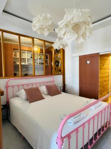 A bed or beds in a room at Le trois nourrices