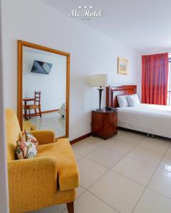 Cama ou camas em um quarto em Mc Hotel Ica