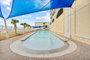 a swimming pool in the middle of a building at San Carlos #407 in Gulf Shores