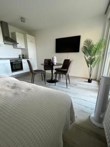 Kuchyň nebo kuchyňský kout v ubytování Wanderlust Petrisberg - Studio 54