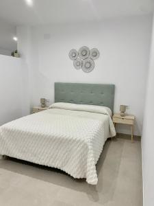Postel nebo postele na pokoji v ubytování Apartamento Antonio