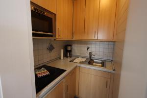 Kuchyň nebo kuchyňský kout v ubytování Haus Ausreißer 2 - Ankerplatz