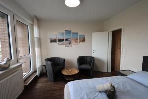 Postel nebo postele na pokoji v ubytování Haus Ausreißer 2 - Ankerplatz