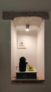 a room with a counter with a toaster on a table at HH_AMENTE5 in Molfetta