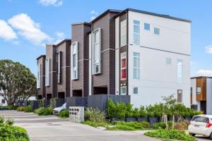 an image of an apartment building at 3 Bedroom Stunner in Hobsonville - WiFi - Netflix in Auckland