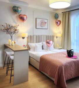 Łóżko lub łóżka w pokoju w obiekcie Kurkowa Apartments