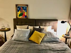Postel nebo postele na pokoji v ubytování Aisa Apartment Cozy