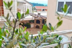 a view of a courtyard from a building at Villa Ilijana in Tivat