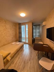 A television and/or entertainment centre at Colonel apartment 938 Még 5 kép
