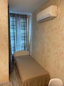 A bed or beds in a room at Colonel apartment 938