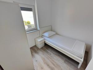 Posteľ alebo postele v izbe v ubytovaní Eva Apartment 2