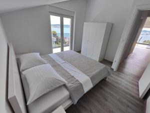 Posteľ alebo postele v izbe v ubytovaní Eva Apartment 2
