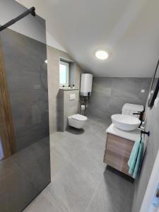 Kúpeľňa v ubytovaní Eva Apartment 2
