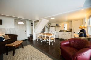 a living room with a couch and a table at Lake House in Nashville