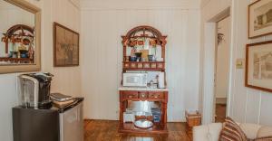 a kitchen with a refrigerator and a microwave at Nashville Suite 1 in Nashville +12 photos