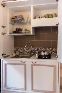 Η κουζίνα ή μικρή κουζίνα στο Campo Marzio Charming B&B +32 φωτογραφίες