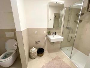 Koupelna v ubytování Urban Oasis: Stylische Wohnung