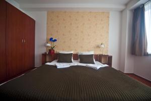 Posteľ alebo postele v izbe v ubytovaní Canada Hotel Budapest