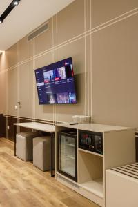 TV a/nebo společenská místnost v ubytování Hotel PortSide GF
