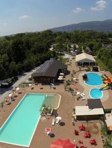an overhead view of a pool at a resort at LA VILLETTA DI MR MAX in Merone