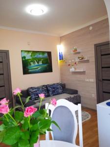 Μια τηλεόραση ή/και κέντρο ψυχαγωγίας στο Апартаменти " З ЛЮБОВ'Ю "