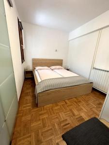Postel nebo postele na pokoji v ubytování Semelbauer Apartment Portorož