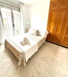 Posteľ alebo postele v izbe v ubytovaní Apartamento Claudio Marcelo, 1