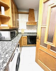 Kuchyňa alebo kuchynka v ubytovaní Apartamento Claudio Marcelo, 1
