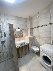 Ένα μπάνιο στο Platinum Apartament