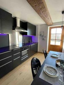 Köök või kööginurk majutusasutuses Gîte de charme bord de Meuse