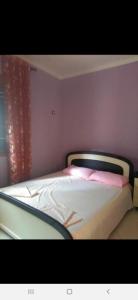 Postel nebo postele na pokoji v ubytování PARADISE VILLA