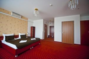 Posteľ alebo postele v izbe v ubytovaní Canada Hotel Budapest