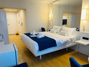 Postel nebo postele na pokoji v ubytování #Orbi-city
