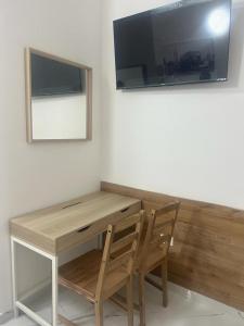 TV a/nebo společenská místnost v ubytování Roma Palace