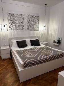 Voodi või voodid majutusasutuse Riverside Apartment toas