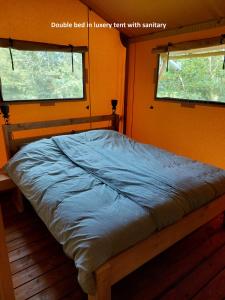 Glamping Essenhof客房内的一张或多张床位