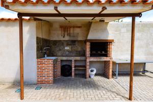 Kuchyň nebo kuchyňský kout v ubytování Las Casas de Pecheye