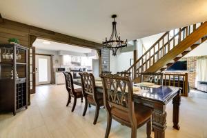 a dining room with a table and chairs at Exciting Tobyhanna Home Near Kalahari Water Park! in Tobyhanna