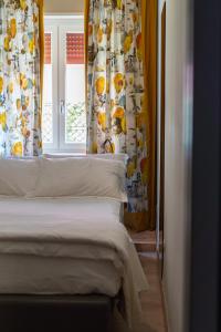 Кровать или кровати в номере Maison Verona Valverde 65