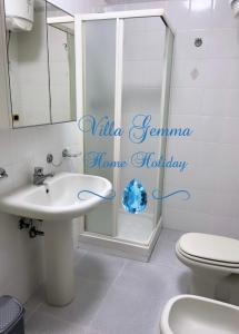 a bathroom with a shower and a sink at Villa Gemma in Campomarino +44 photos