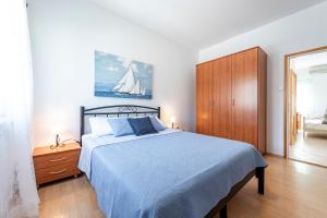 Posteľ alebo postele v izbe v ubytovaní Apartments Mirjana Mljet
