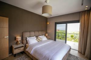 מיטה או מיטות בחדר ב-Riad Bella Montana