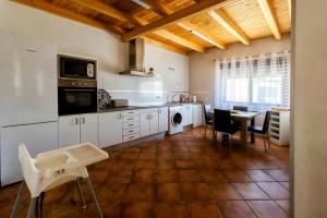 Kuchyň nebo kuchyňský kout v ubytování Las Casas de Pecheye