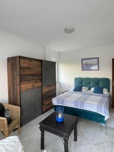 Łóżko lub łóżka w pokoju w obiekcie Apartman Kačić